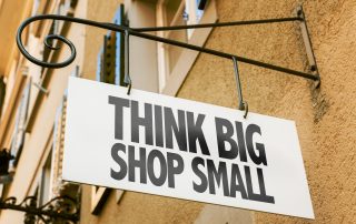 Business sign hanging outside